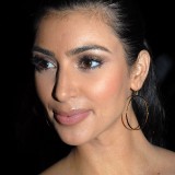 Kim-Kardashian---2009-Moves-Magazine-Super-Bowl-Party-01