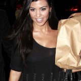 Kim-and-Kourtney-Kardashian-at-Pepsi-Christmas-Party-14