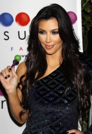 Kim-Kardashian---Launch-Of-Sugar-Factory-Couture-Lollipop-Series-05.md.jpg