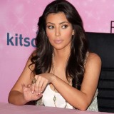 Kim-Kardashian---Signs-Her-New-Fitness-DVD-08