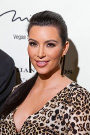Kim-Kardashian---Grand-Opening-Of-Kardashian-Khaos-09.md.jpg