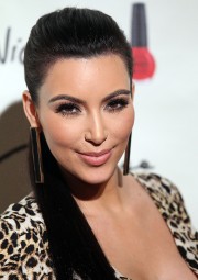 Kim-Kardashian---Grand-Opening-Of-Kardashian-Khaos-24.md.jpg