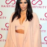 Khloe-and-Kim-Kardashian---Hairfinity-UK-Launch-Party-10