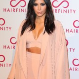 Khloe-and-Kim-Kardashian---Hairfinity-UK-Launch-Party-12