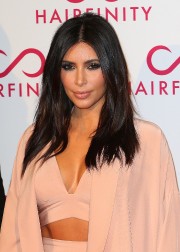 Khloe and Kim Kardashian Hairfinity UK Launch Party 32