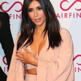 Khloe-and-Kim-Kardashian---Hairfinity-UK-Launch-Party-34