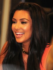 Kim and Khloe Kardashian Promote The Kardashian Kollection 26
